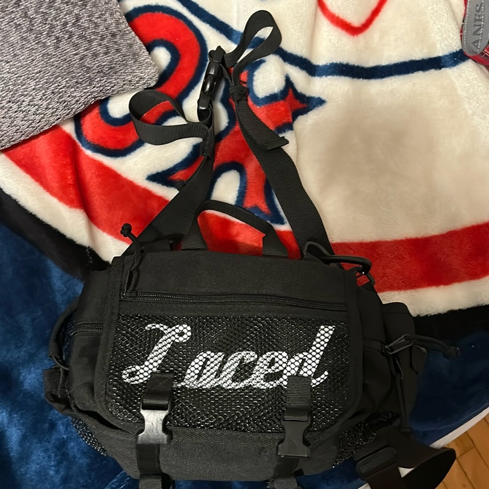 Laced travel accessory bag with tons of pockets